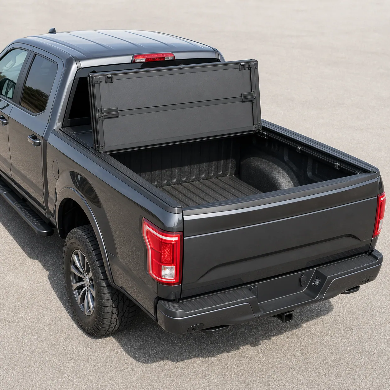 BAKFlip MX4 hard folding cover on a pickup with one front panel folded open