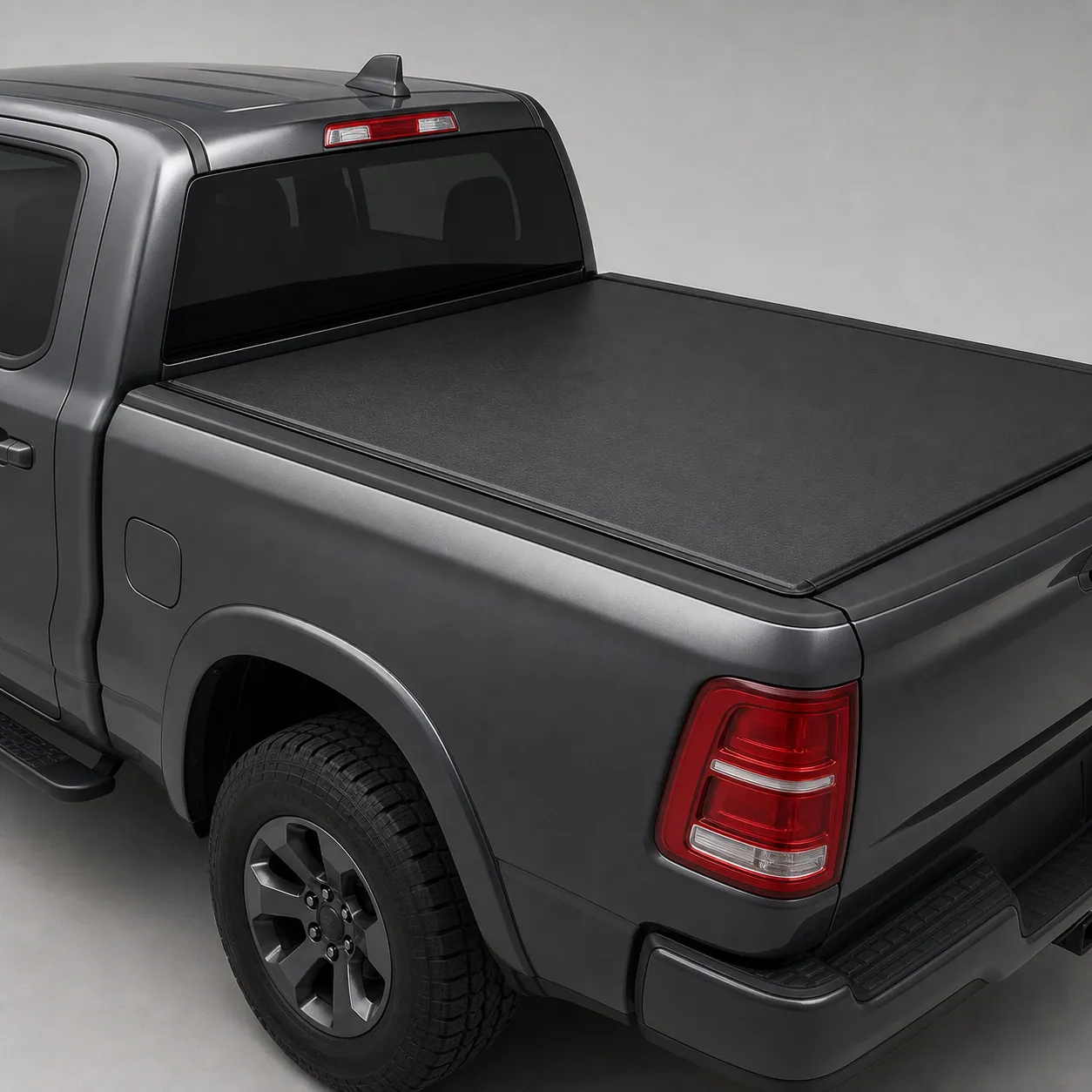 [Gator ETX soft roll-up tonneau cover installed on a truck bed showing the low inside-rail mount profile from the side]